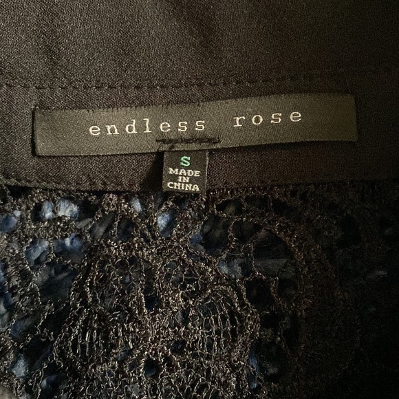 Endless Rose zip jacket. Small. Black. Floral top. White shown as stock photo. - Picture 6 of 9